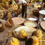 Dough vats and finished bread Dough vats and finished bread.
