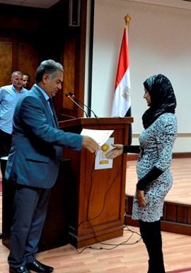 Rudeina Bayomi receives her MRFS 2014 graduation certificate from Dr Mamdouh el-Damaty, Minister of Antiquities. Photo by Sayed Salah.